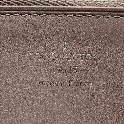 LOUIS VUITTON ルイ・ヴィトン ポルトフォイユ・コメット 長財布 トリヨン マグノリア M63103 レディース 【中古】