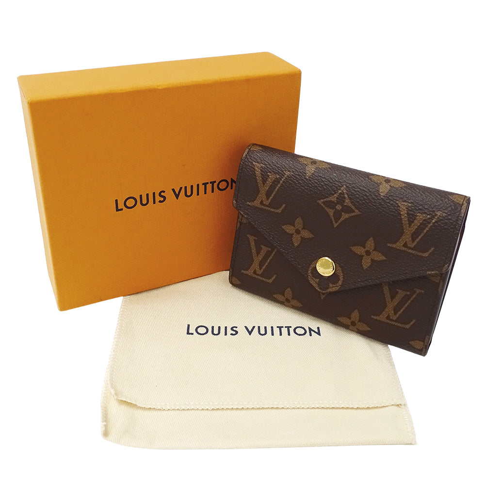 LOUIS VUITTON ルイ・ヴィトン ポルトフォイユ ヴィクトリーヌ 三つ折り財布 モノグラム フューシャ M41938 モノグラムキャンバス レディース 【中古】