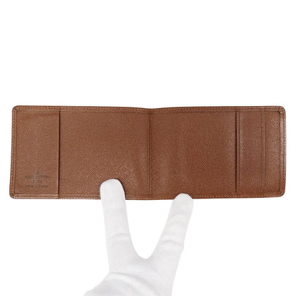 LOUIS VUITTON ルイ・ヴィトン ポルトトレゾール・エテュイシェキエ 三つ折り財布 ブラウン M61200 モノグラム レディース メンズ 【中古】