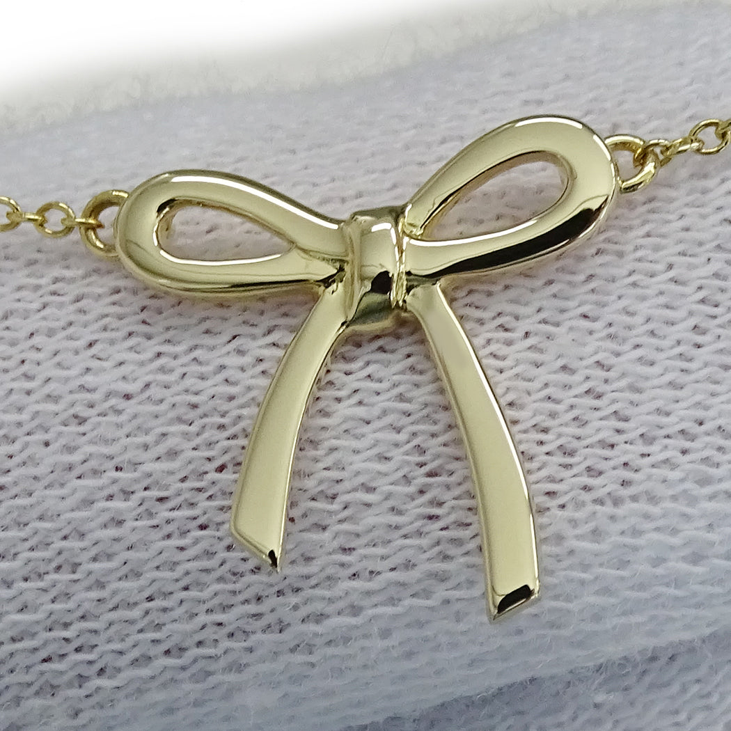 TIFFANY&Co. ティファニー ボウ リボン ネックレス 750YG レディース 磨き済み 【中古】