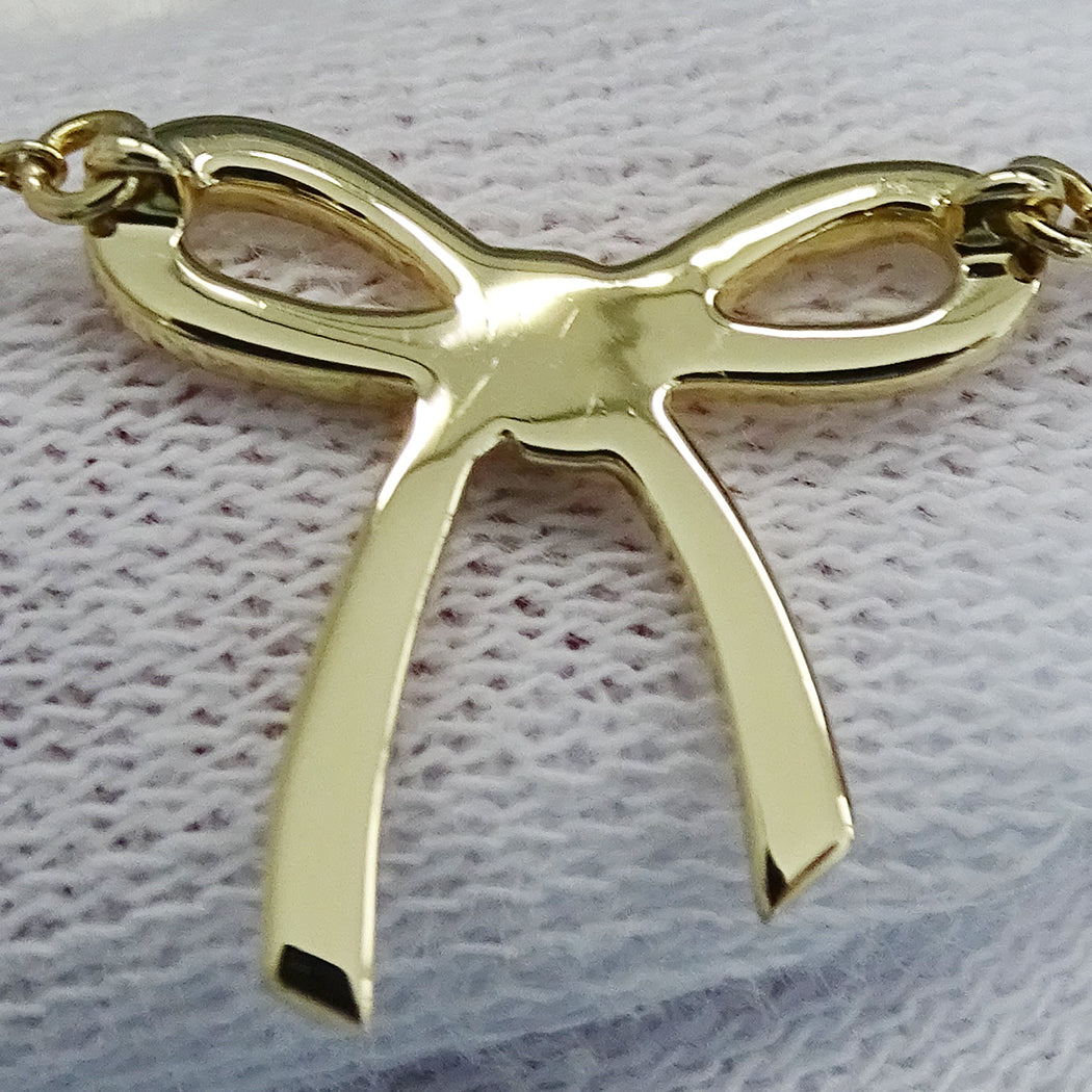 TIFFANY&Co. ティファニー ボウ リボン ネックレス 750YG レディース 磨き済み 【中古】
